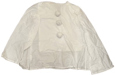 oversized white top with long sleeves and three balls pinned on